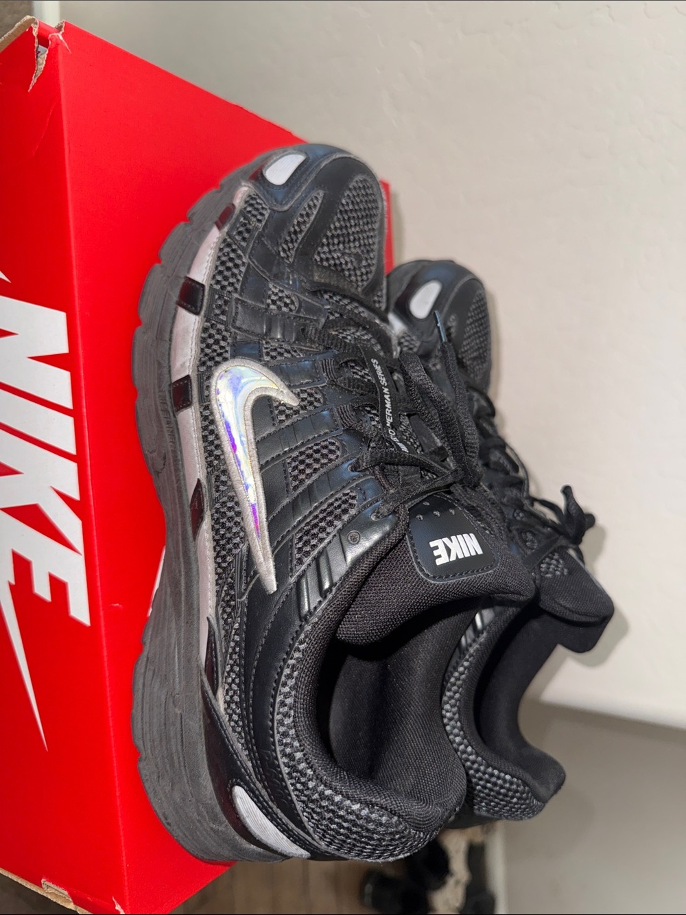 Nike Black Sneakers with Iridescent Swoosh